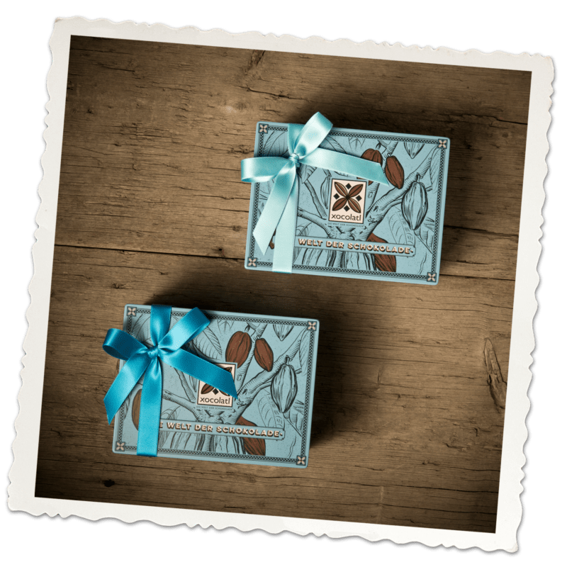 Blaue Geschenk-Blechdose mit Cacao-Illustration